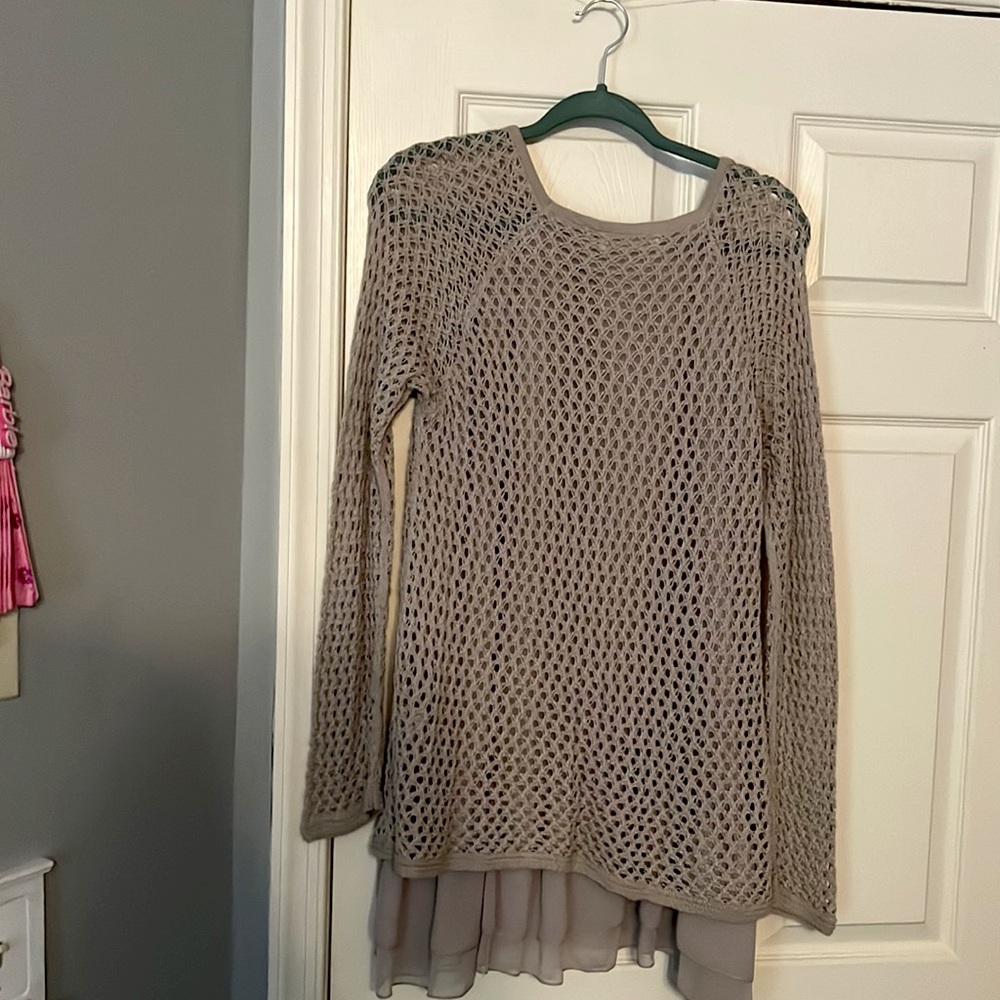 Here is a dress/shirt that you can wear leggings under
